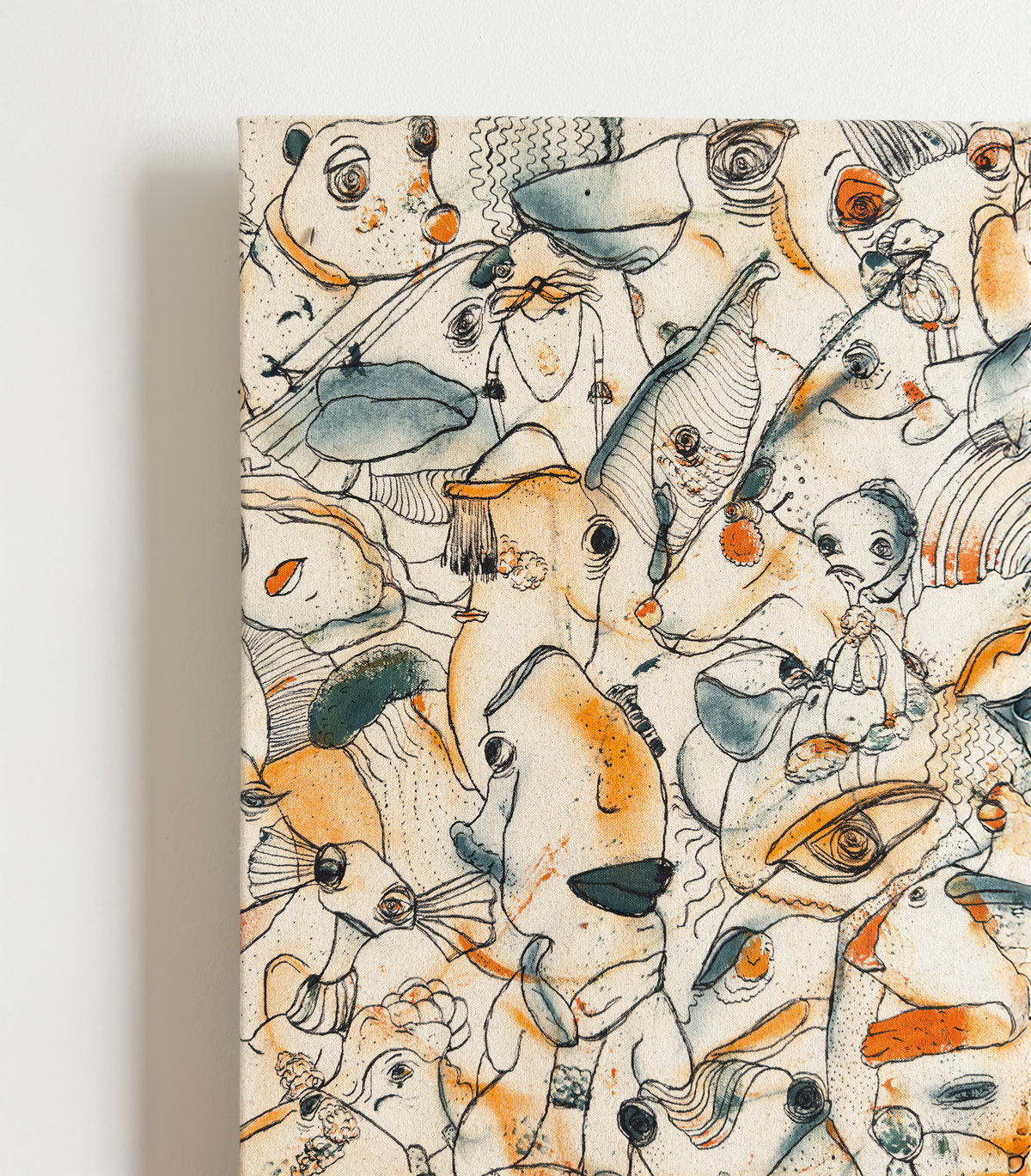 Abstract expressionism artwork on raw cotton canvas. Colours are orange tones, dark and light blue/teal brush strokes. Organic patterns and faces expressing different emotions. Made by Studio Thicia Luiza
