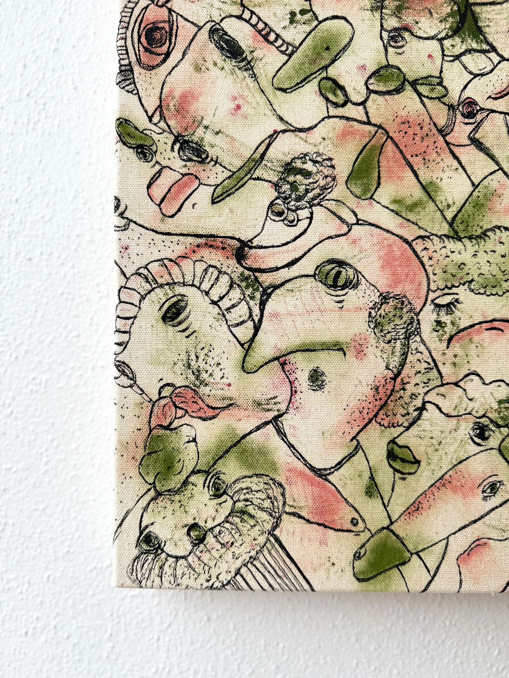 Abstract expressionism artwork on raw cotton canvas. Colours are pink tones, and light green/olive brush strokes. Organic patterns and faces expressing different emotions. Details.  Made by Studio Thicia Luiza