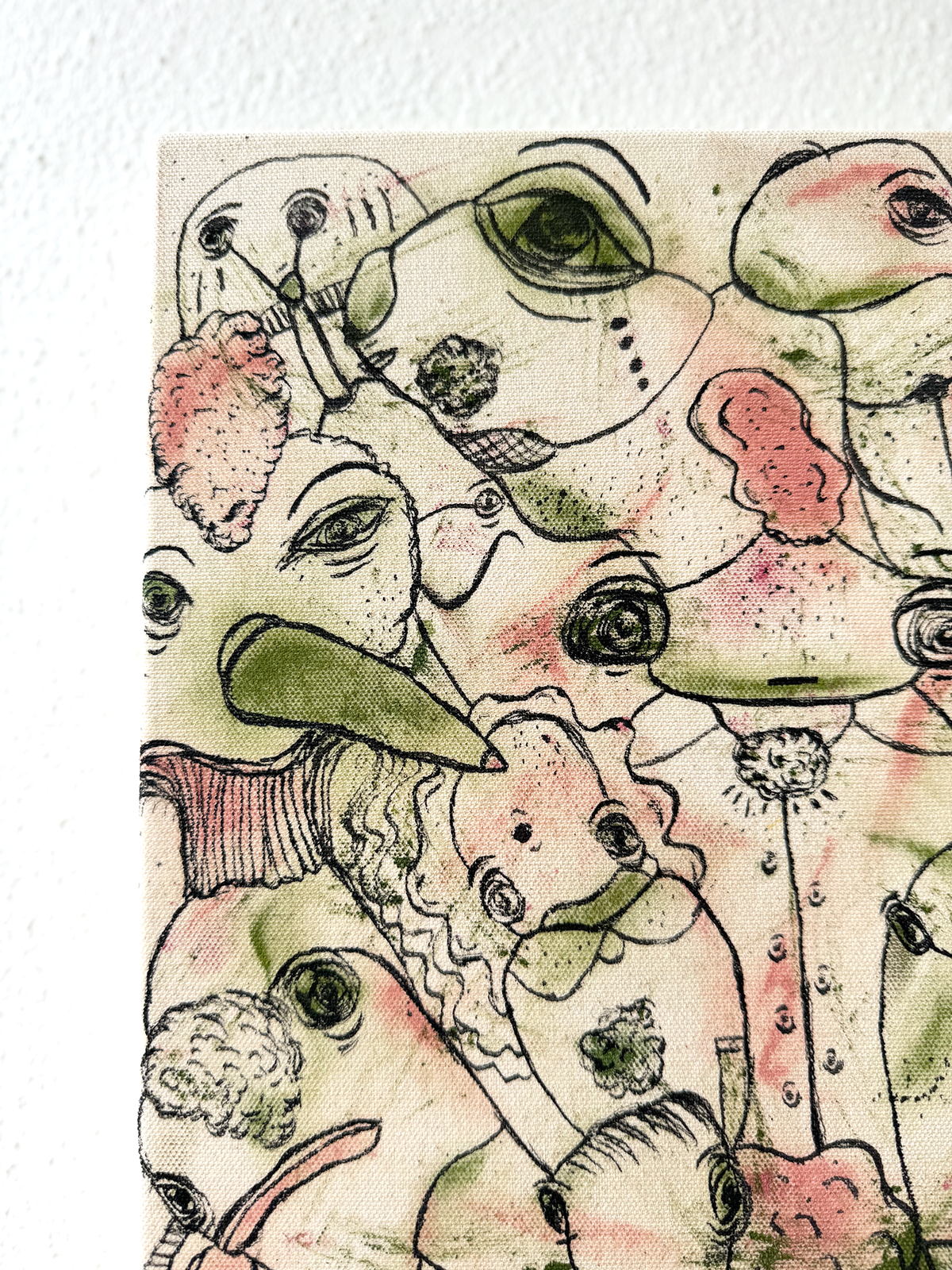 Abstract expressionism artwork on raw cotton canvas. Colours are pink tones, and light green/olive brush strokes. Organic patterns and faces expressing different emotions. Details, side. Made by Studio Thicia Luiza